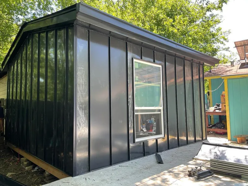 Black standing seam metal wall panels for Roof Inspection in Redford