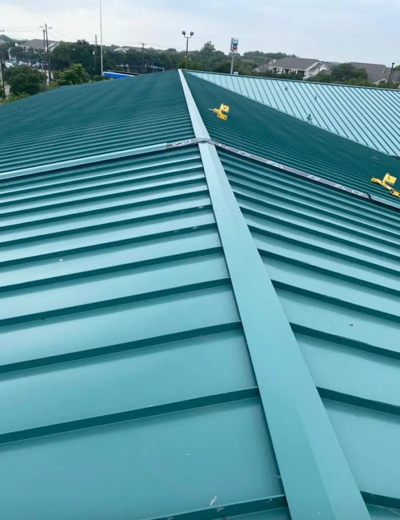 Green commercial metal roof ridge and valley for Metal Roof Repair in Redford