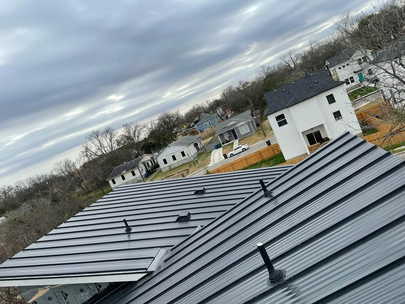 Standing seam metal roof panels with vents for Skylight Repair in Redford